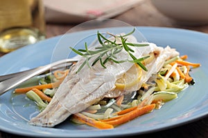 Baked sea bass with vegetables