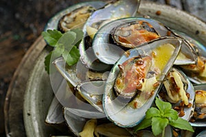 Baked shellfish with butter and fried garlic