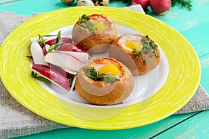 Baked small flavorful bun with bacon, cheese, quail egg and greens