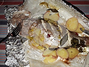 Baked snapper fish with Asian style herbs and spices