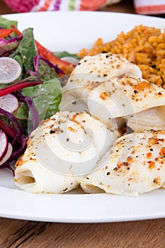 Baked sole with rice and salad