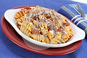 Baked spriral rotelle pasta in meat sauce