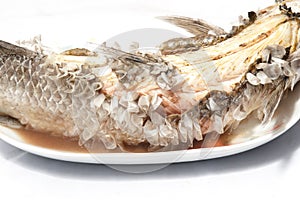 Baked Striped snakehead fish with salt coated.