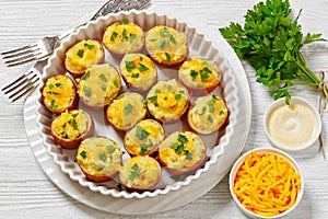 baked stuffed red potato on white baking dish