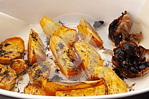 Baked sweet potato with black garlic