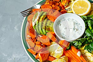 Baked sweet potato, zucchini and carrots