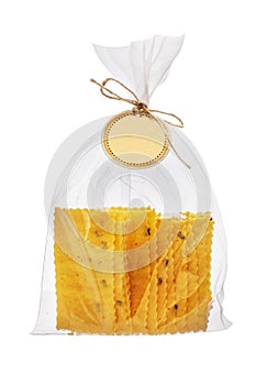 Baked thin crispy crackers with cheese and olives isolated over