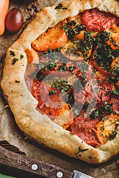 Baked tomato galette on baking paper