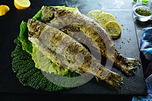 Baked Trout with Herbs, Lemon, and Steamed Kale