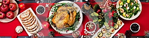 Baked turkey. Christmas dinner. The Christmas table is served with a turkey, decorated with bright tinsel and candles. Fried