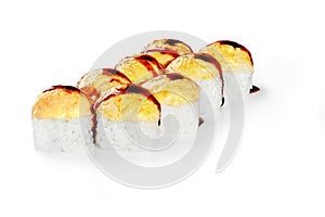 Baked uramaki rolls with salmon, hat of melted cheese and unagi sauce