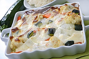 Baked vegetable in white creamy sauce