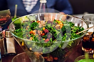 Baked vegetables, walnuts and kale salad