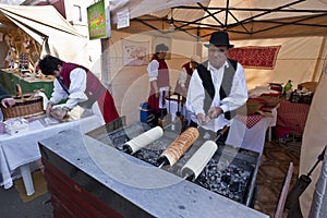 Baker make traditional Hungarian cake at a festival