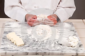 Baker Pinching Dough