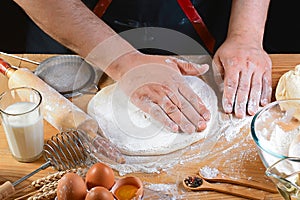 Baker rolling dough with flour bread, pizza or pie recipe ingredients with hands, food on kitchen table background, working with m