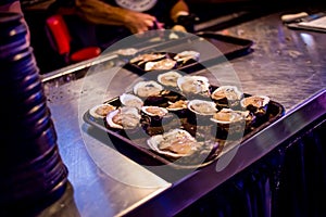 A Baker`s Dozen of Fresh Shucked Raw Oysters