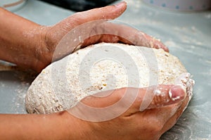 Baker shaping load of bread