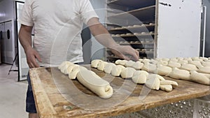 baker showing bread tray photo