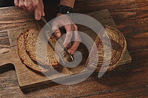 Baker Slicing Bran Bread