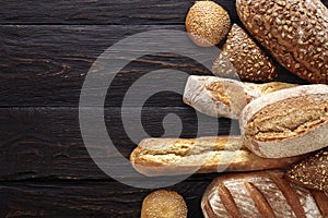 Bakery background, bread assortment on black