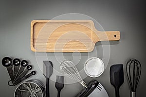 Bakery background. Bread cutting board, Measuring spoon, Stainless steel flour sifter, Spatula, Food processor, Pastry brush,