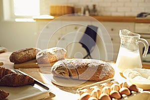 Bakery baker bread. Fresh homemade bread on a table in the kitchen.