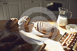Bakery baker bread. Fresh homemade bread on a table in the kitchen.