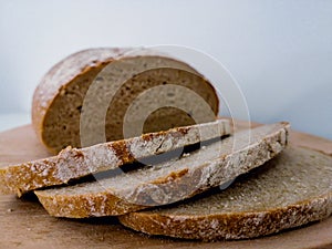 Bakery-Bavarian bread on wood plate in kitchen