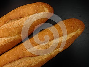 Bakery Bread of Baguette on black background