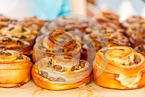 Bakery Bread on a Wooden Table. Various Bread and Sheaf of Wheat