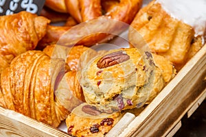 Bakery Bread on a Wooden Table. Various Bread and Sheaf of Wheat