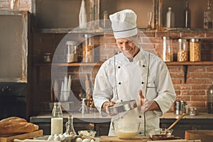 Bakery chef cooking bake in the kitchen professional