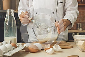 Bakery chef cooking bake in the kitchen professional