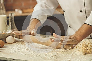 Bakery chef cooking bake in the kitchen professional