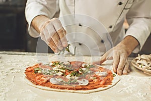 Bakery chef cooking bake in the kitchen professional