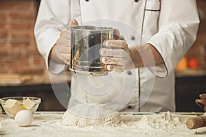 Bakery chef cooking bake in the kitchen professional