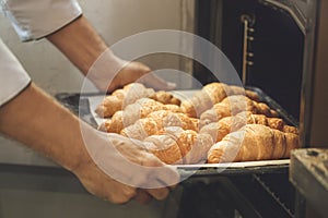 Bakery chef cooking bake in the kitchen professional photo