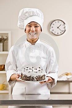 Bakery chef in toque and chefs whites photo