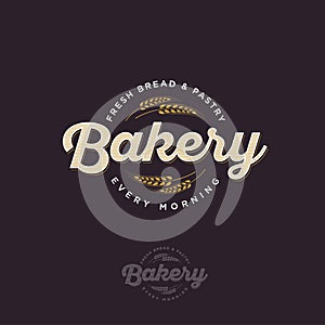 The bakery logo with spikelet. Bread and baking emblem. photo