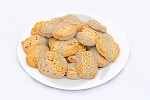 bakery MIX cookies and biscuits in plate on white isolated background