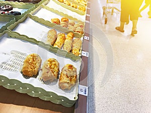 Bakery products display on shelf at supermarket