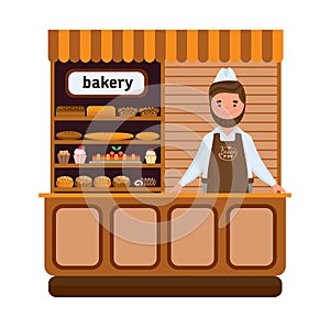 Bakery products and elite bread, sweets, seller in firm apron