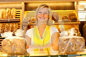 Bakery shopkeeper posing in shop