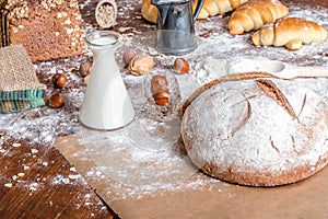 At the bakery, still life with bread, nuts and flour