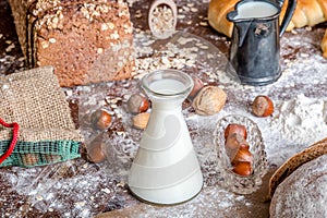 At the bakery, still life with bread, nuts and flour