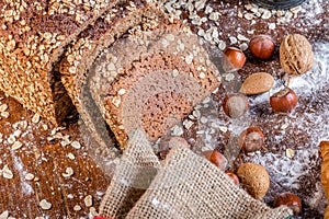 At the bakery, still life with bread, nuts and flour