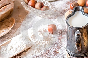 At the bakery, still life with bread, nuts and flour