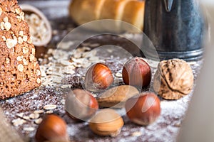 At the bakery, still life with bread, nuts and flour