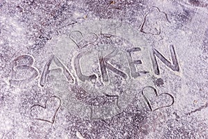 Baking Backen in German letters written in flour